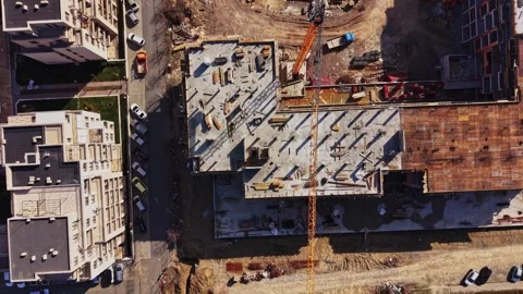 Aerial view of a tower crane at a construction site Stock Footage 338220927