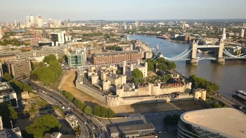 Aerial View of Tower of London, Tower Bridge and Canary Wharf Stock Footage