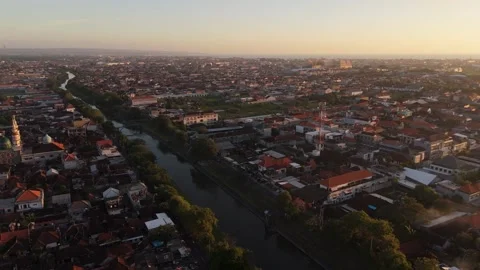 Aerial View of Town and River at Sunset, Bali Video stock 337606911