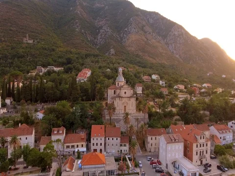 Aerial view of town with mountain on the background. Video stock 79983220