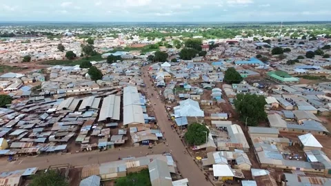Aerial view of a town with rusty iron sheet roofs Stock Footage 322771896