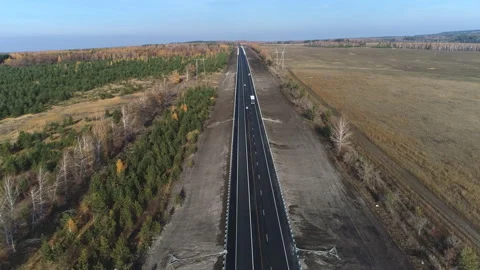 Aerial view of the track along the forest Stock Footage 99248345