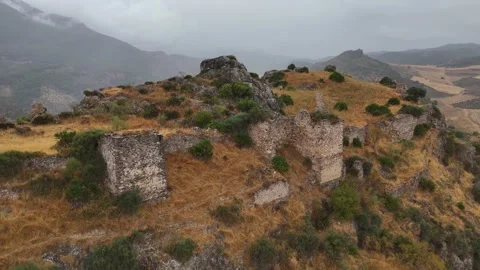 Aerial view tracking back from Turón Castle ruins, Ardales, Málaga, Spain Vídeos de archivo 320420953