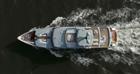 Aerial view tracking of beautiful modern white superyacht. Lifestyle luxury boat 库存影片 306318212