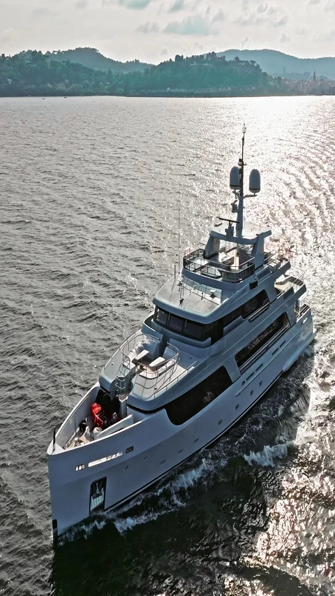 Aerial view tracking of beautiful modern white superyacht. Lifestyle luxury Vídeo Stock 319967053