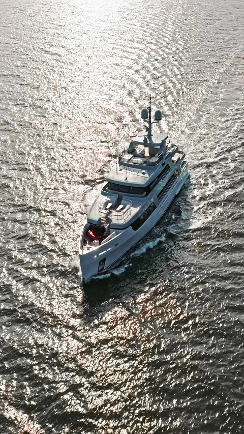 Aerial view tracking of beautiful modern white superyacht. Lifestyle luxury 库存影片 320420809