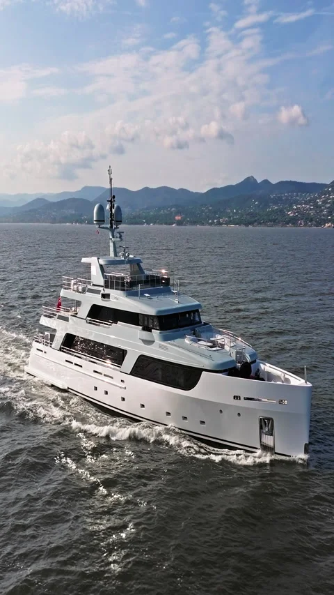 Aerial view tracking of beautiful modern white superyacht. Lifestyle luxury 库存影片 320887627