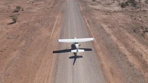 Aerial view tracking Cessna 172 taxiing Stock Footage 92556539