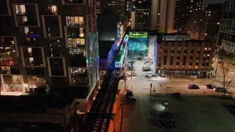 Aerial view tracking the CTA Holiday train, night in South Loop, Chicago, Stock Footage 226294448