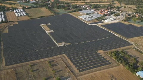 Aerial View Tracking Right Over Solar Farm Power Plant Video stock 346809733