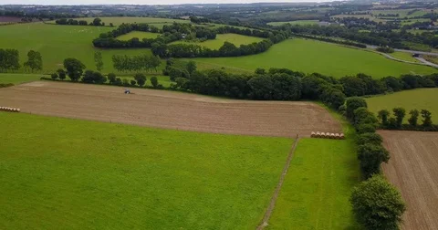 Aerial view of tractor on field Video stock 84880354