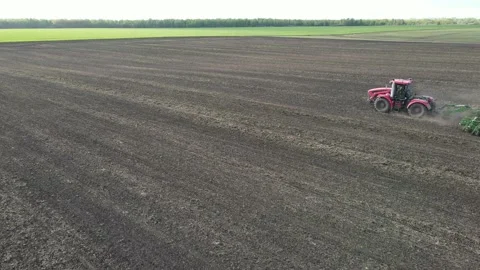 Aerial view of tractor operation Stock Footage 194564809