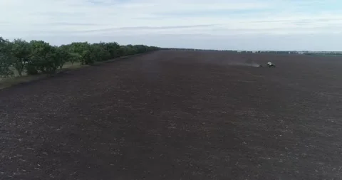 Aerial View Tractor Plowing Field (Agriculture) Stock Footage 136310853