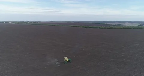 Aerial View Tractor Plowing Field (Agriculture) Stock Footage 136310864