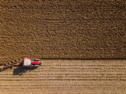 Aerial view, Tractor plowing fields, preparing land for sowing Foto stock