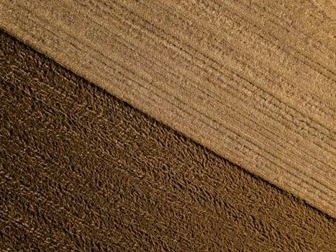 Aerial view, Tractor plowing fields, preparing land for sowing Foto stock