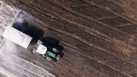 Aerial View Of A Tractor Pouring Lime Into The Soil Stock Footage 276651901