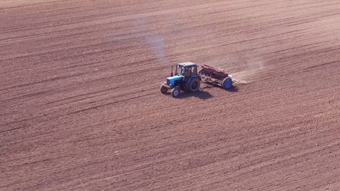 Aerial view of tractor on Prepare a field for planting 動画素材 76242813