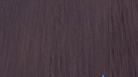Aerial view of tractor on Prepare a field for planting Stock Footage 76243198