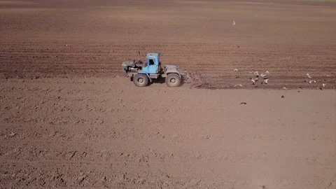 Aerial view of tractor on Prepare a field for planting Video stock 76243690