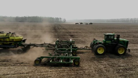 Aerial view of a tractor preparing a field for sowing. Stock Footage 289267726