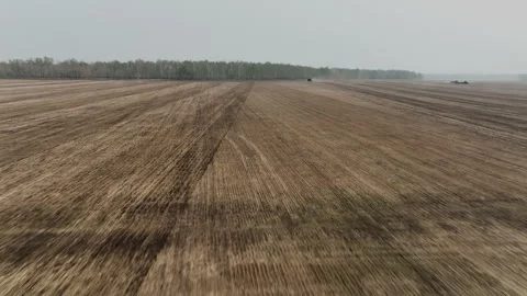 Aerial view of a tractor preparing a field for sowing. Stock Footage 289267742