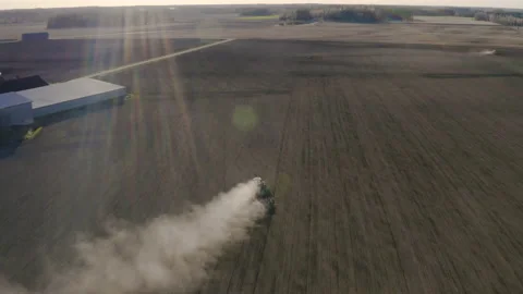 Aerial view of a tractor sowing on a field Stock Footage 134373428