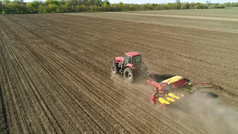 Aerial view of tractor working in the field 스톡 동영상 129055089