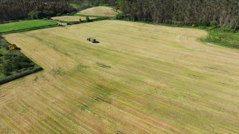 Aerial View Of A Tractor Working In The Field - Drone Shot Stock Footage 276651905