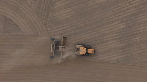 Aerial view of tractor working in a field in Middenmeer, Netherlands. Stock Footage 340285748