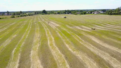 Aerial view of tractor working on wheat field Stock Footage 140301177