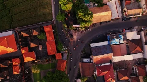 Aerial view of traditional Bali intersection at sunset Stock Footage 313099998