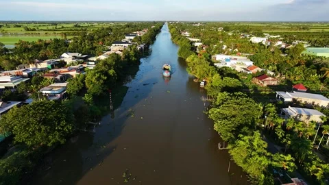 Aerial View Of Traditional Boat Navigating Calm Waterway In Vietnam Stock-Footage 340548132