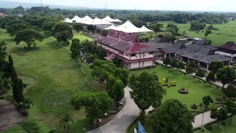 Aerial view of traditional building complex with lush greenery - Trowulan M.. Stock-Footage 279667003