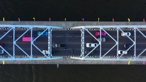Aerial view on traffic bridge over river, cars on bridge. Stock Footage 107306360