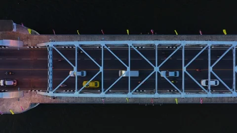 Aerial view on traffic bridge over river, cars on bridge. Stock Footage 107310051