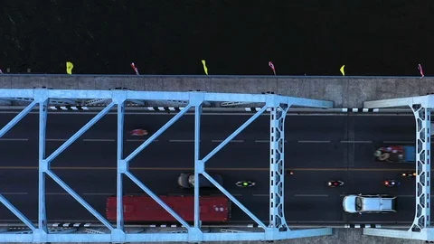 Aerial view on traffic bridge over river, cars on bridge. Stock Footage 107310130