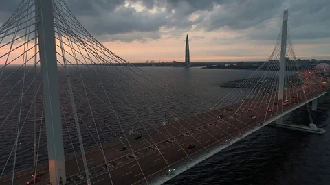 Aerial view traffic on the cable bridge with illumination in evening Stock Footage 127538838