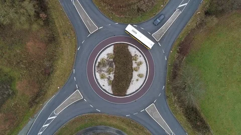 Aerial view of a traffic circle - time lapse Stock-Footage 100001357