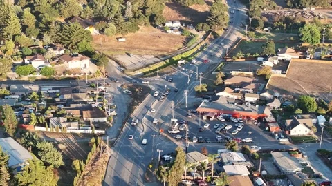 Aerial View of traffic during sunset in Las Lomas California Stock Footage 252886797