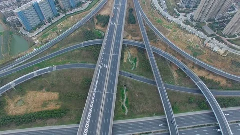 Aerial view of traffic on elevated freeway at intersection city suburbs,china Stock Footage 75862904