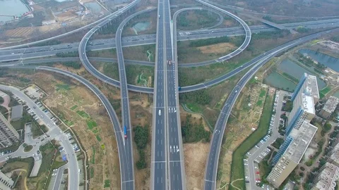 Aerial view of traffic on elevated freeway at intersection city suburbs,china Stock Footage 75864069