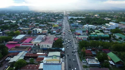 Aerial view of traffic on highway in small town, General Santos Philippine Stock Footage 267031107