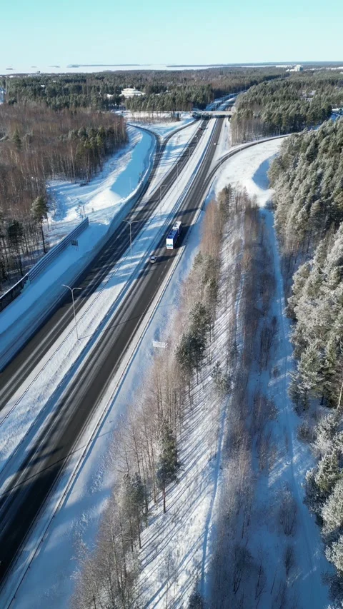 Aerial view of traffic on the highway in wintertime, Oulu Finland Stock-Footage 302353053