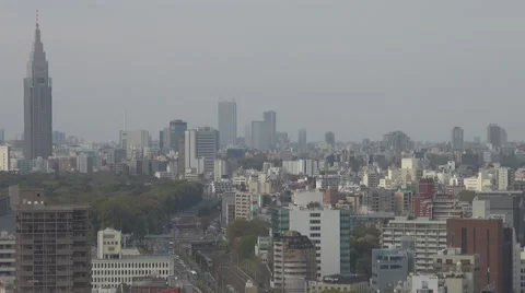 Aerial view traffic infrastructure train railway busy avenue Tokyo downtown day Stock Footage 55889727