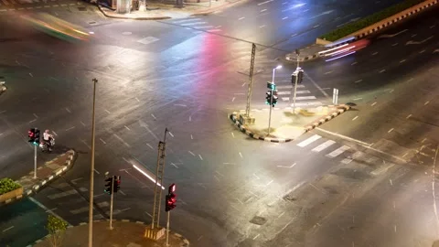 Aerial view of traffic at intersection in Bangkok in night. Time lapse motion Stock Footage 131796159