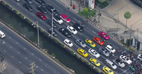 Aerial view of traffic intersection in Bangkok Thailand with colorful priva.. Stock Footage 324939160