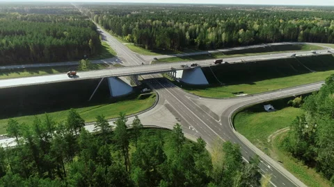 Aerial view of a traffic intersection with moving cars and trucks. Traffic Stock Footage 139864418