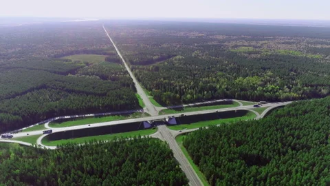 Aerial view of a traffic intersection with moving cars and trucks. Transport Stock-Footage 158013056