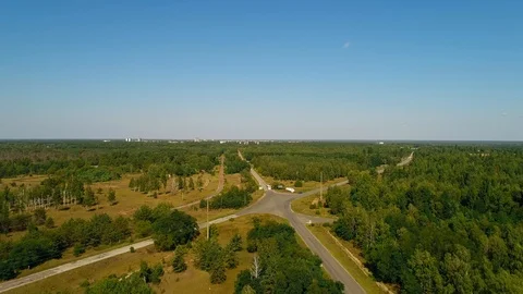 Aerial view of traffic intersection near the city Pripyat and Chernobyl Video stock 123954516